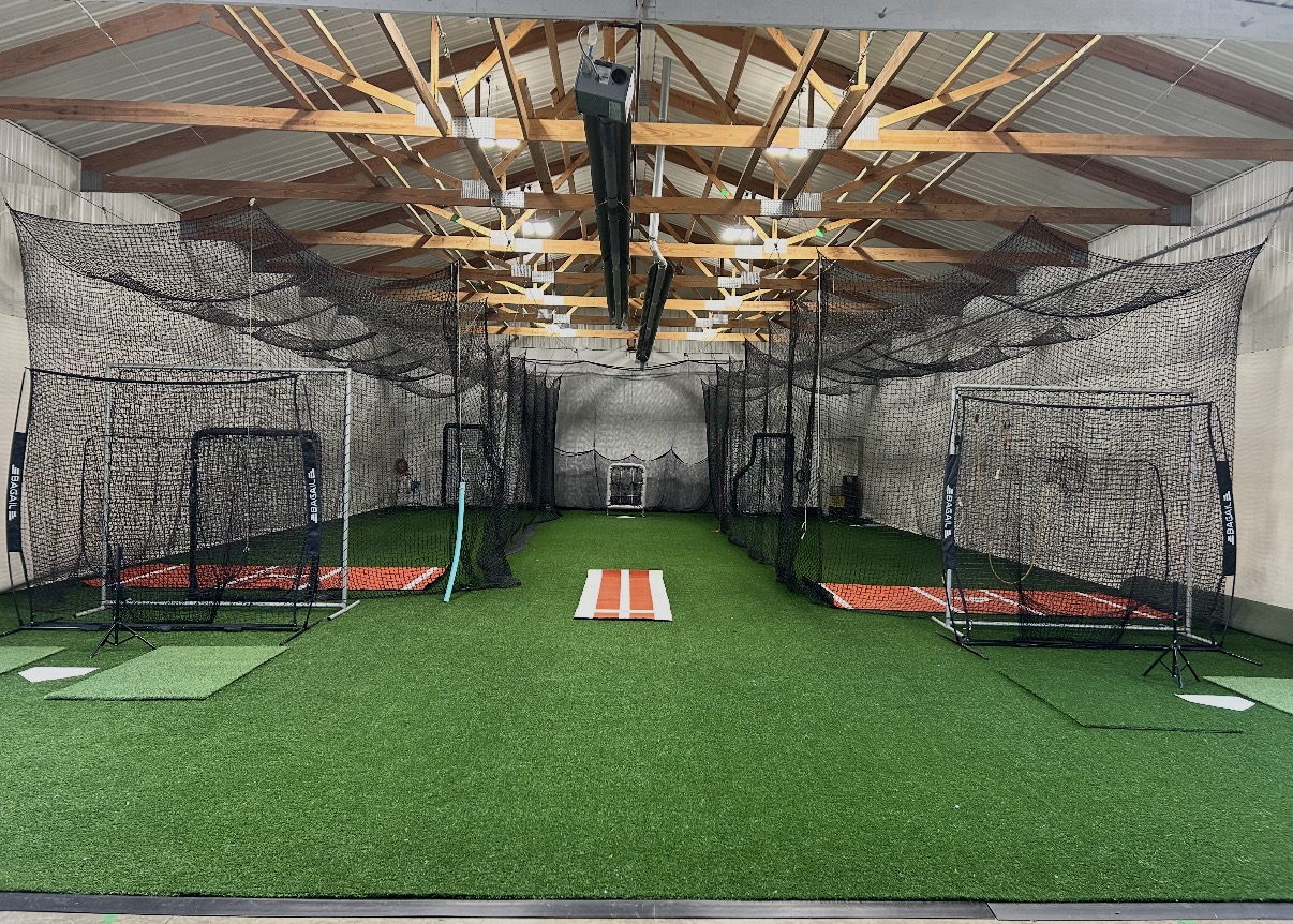 90/10 Mentality indoor training facility with batting cages and turf